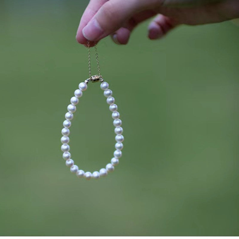 A natural pearl  worn by women Hand catenary WRX Pearls wholesale